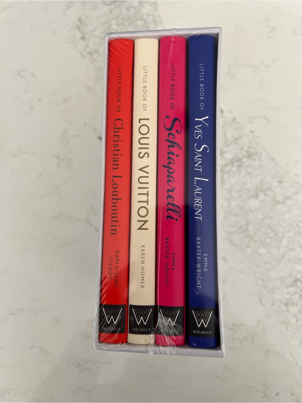 New unopened luxury designer books, set of 4
